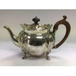 A silver teapot, London hallmarks.