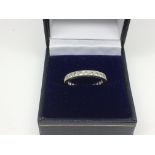 A 9ct white gold eternity ring, approx 2.9g and ap