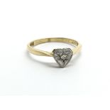 An 18ct gold heart shaped diamond ring, approx 2g