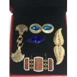 Five buckles comprising enamel and gem stone set e