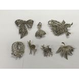 Seven Marcasite brooches, various designs.