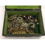 A small box of costume jewellery.