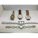 A collection of five watches including Omega, Inge