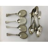 A collection of silver flatware comprising salad s