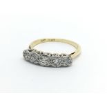 A circa 1950s 18ct gold and platinum ring set with five small diamonds, approx 2.6g and approx
