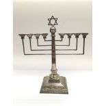 A silver menorah, London hallmarks, approx 25cm.