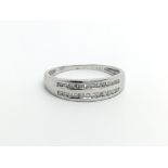 An 18ct white gold ring set with two rows of diamonds, approx.15ct, approx 2g and approx size M-N.