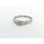 A 9ct white gold solitaire diamond ring, approx .20ct, approx 1.6g and approx size L.