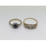 Two gold rings, one set with opals and diamonds, a