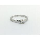 An 18ct white gold solitaire diamond ring set with a princess cut diamond, approx .25ct, approx 2.6g