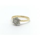 An 18ct gold seven stone diamond ring, approx 1/2ct, approx 3.2g and approx size Q-R.