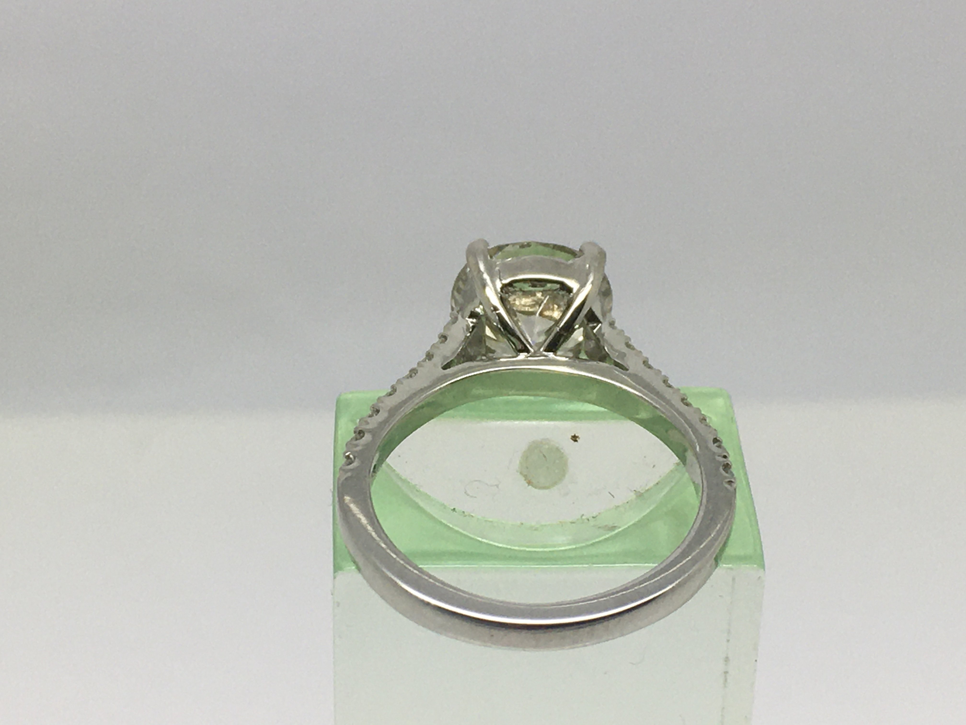 A platinum solitaire diamond ring, the central sto - Image 2 of 2