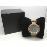 Another cased Michael Kors ladies chronograph watc