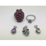 Three multicolour gemstone silver pendants, a silv