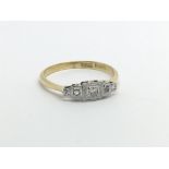 A 1920s 18ct platinum and diamond ring, (K).