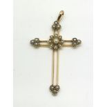 A gold crucifix pendant set with seed pearls, appr