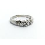 A 9ct white gold ring set with three diamonds, approx 1/2ct, approx 2.7g and approx size K.