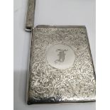 A silver card case with Chester hallmarks.