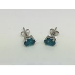A pair of blue apatite ear studs set in silver.