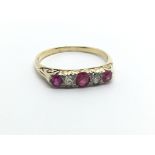 An 18ct gold ruby and diamond ring, approx 2.4g an