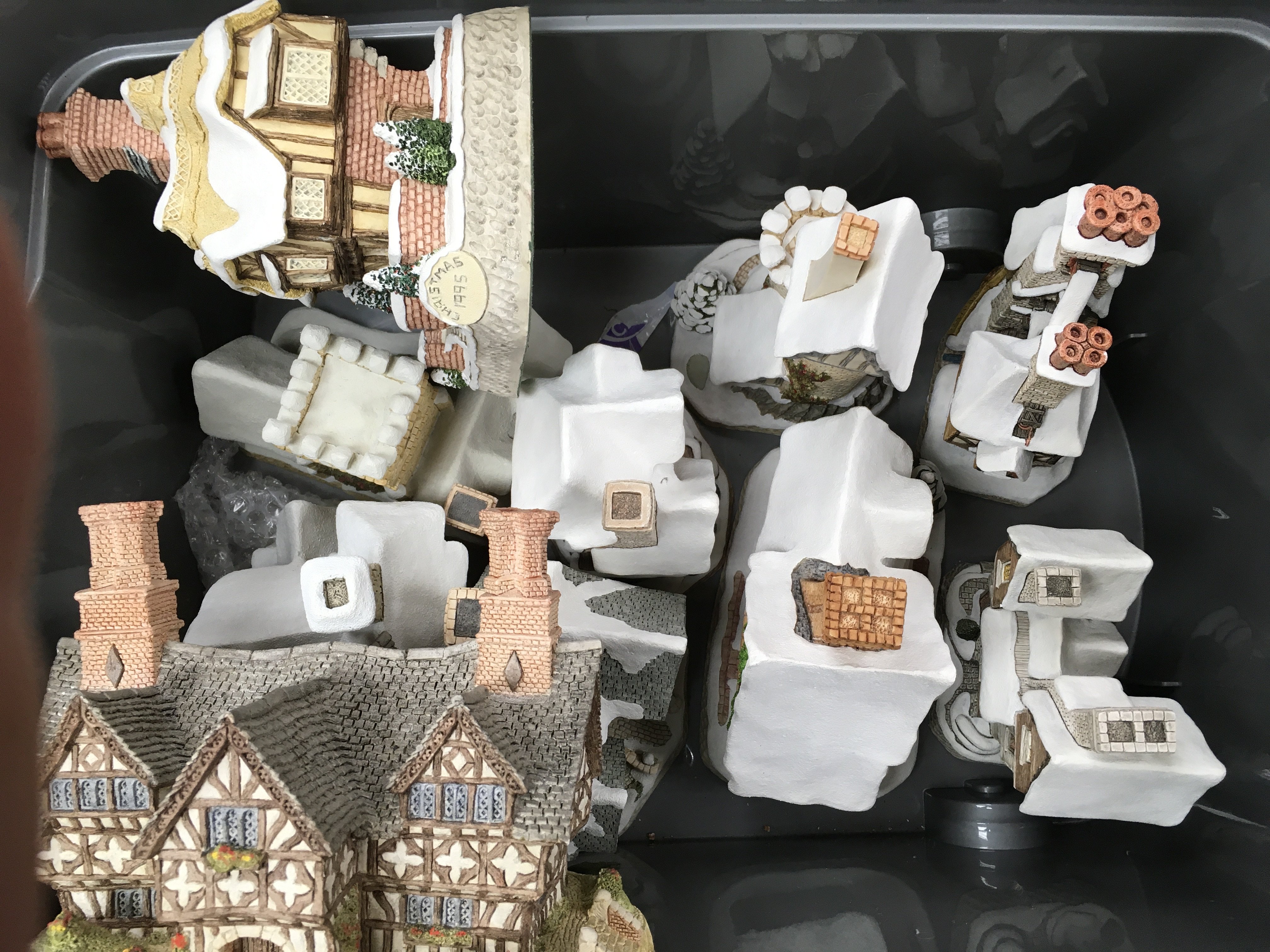 A box containing David Winter houses (10) some at