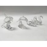 A set of Swarovski figures including a dolphin a w