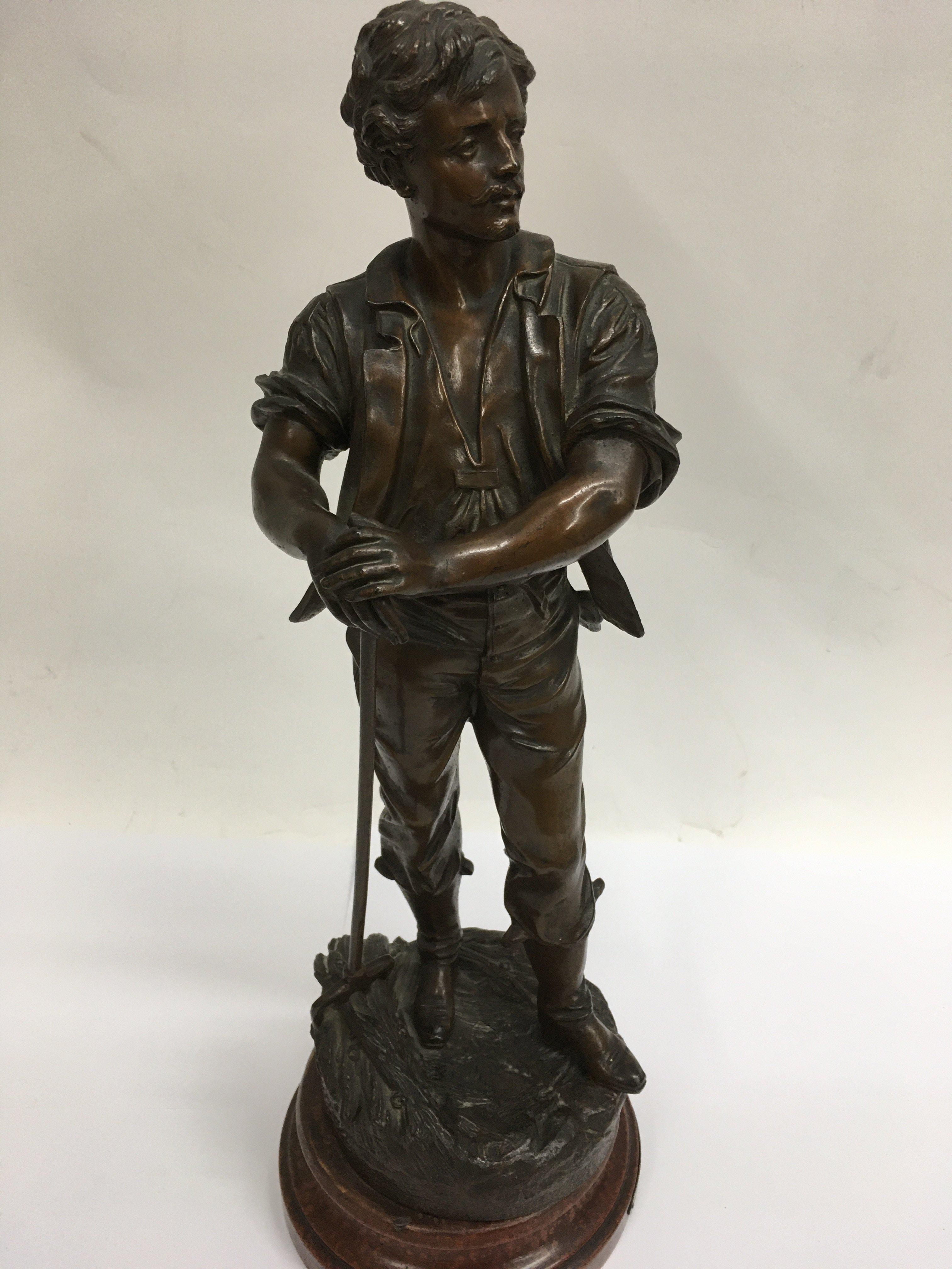 A speltar figure in the form of a farmer.53 cm