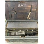 A large carpenters tool box and tools with intitia