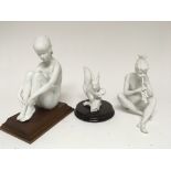 Three Kaiser white ceramic figures of a squirrel a