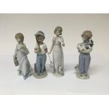 Four Lladro figures. One in the form of a girl hol