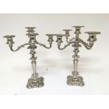 A pair of silver plated candelabra. Hight 36cm