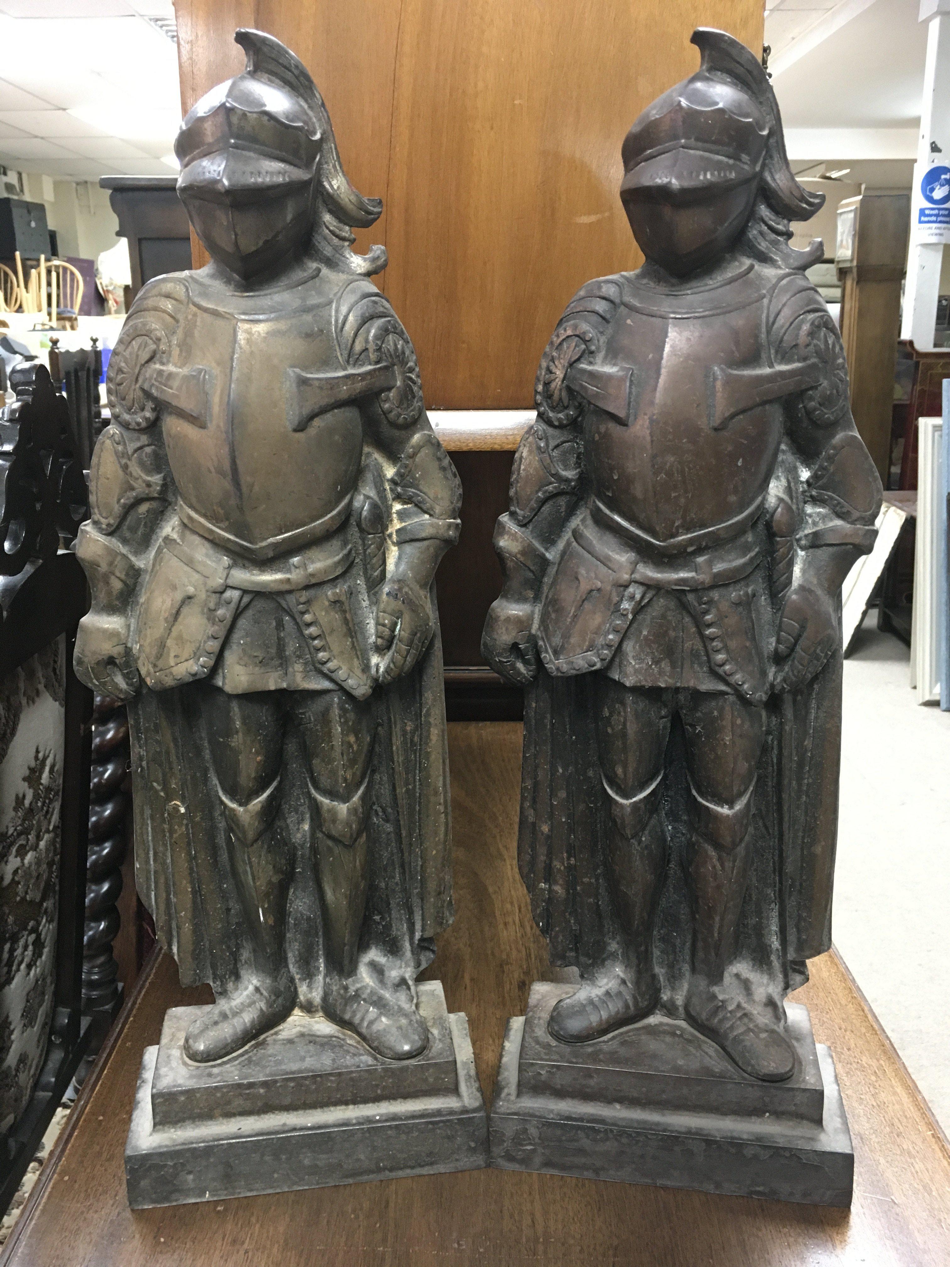 Pre cast iron figures of knights, suitable for fir