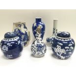Four blue and white vases together with two blue a