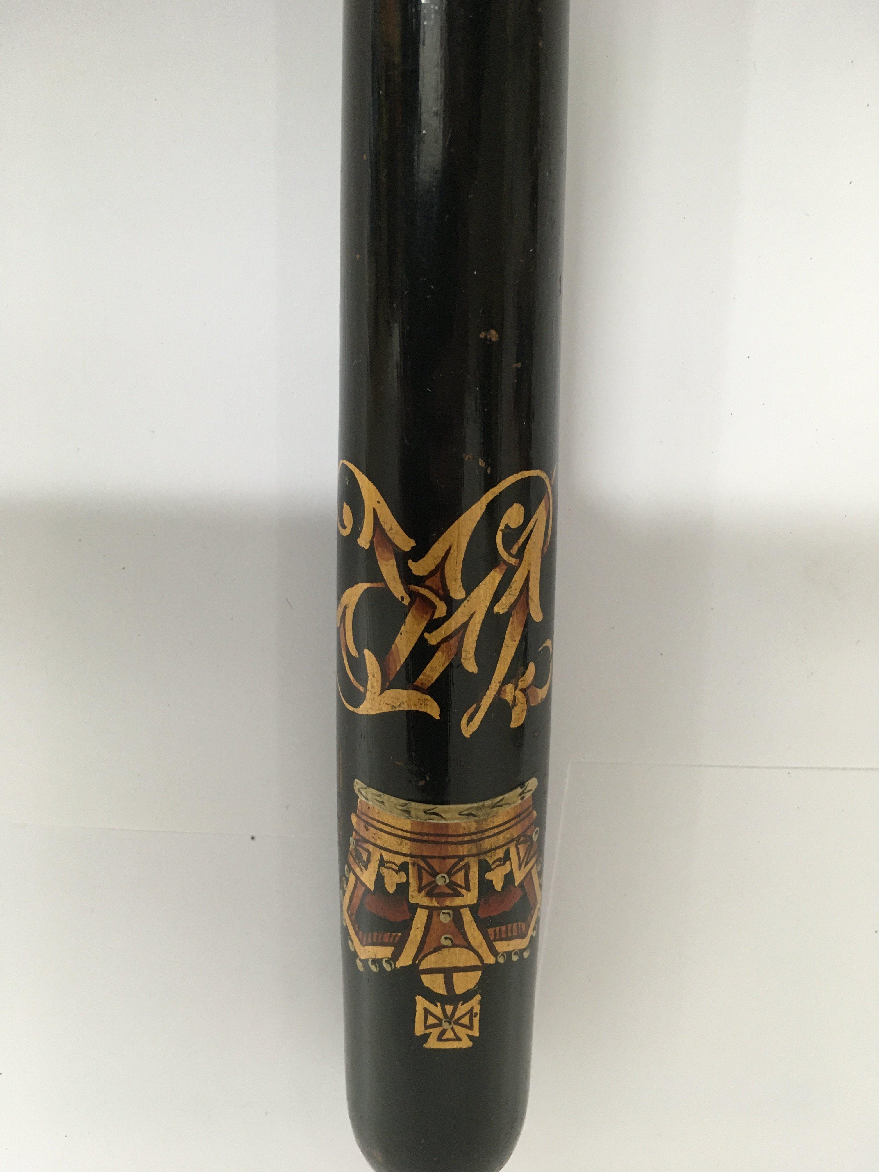 A Victorian truncheon with turned handle .