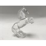 A Swarovski white stallion boxed appox 11 cm in he