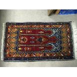 3 eastern wool rugs, 107 x 144 (2) 164 x150cm.