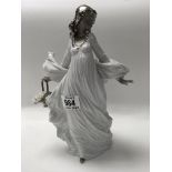 A large Lladro figure titled Spring Splendor. H.30