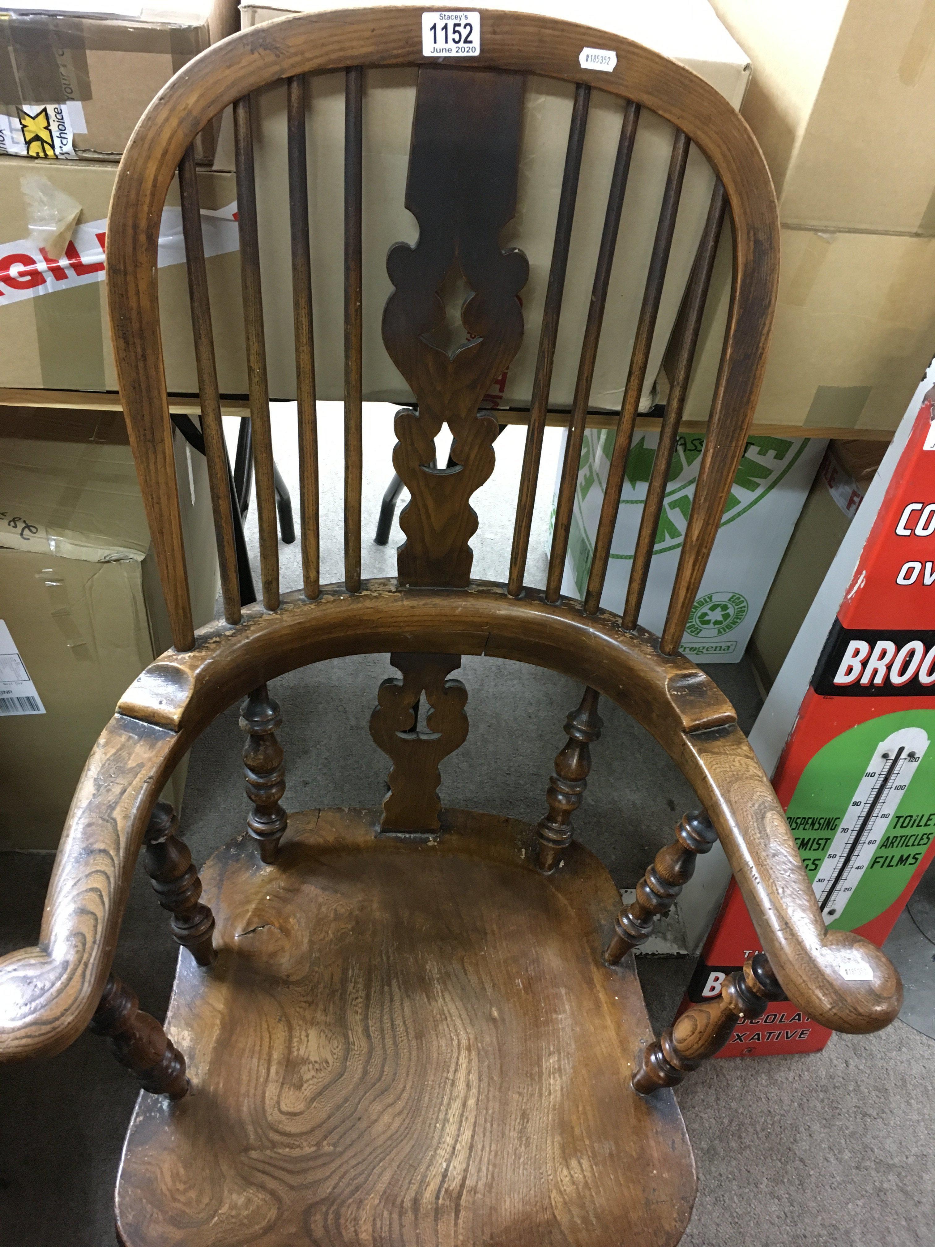 A elm stick back chair with solid seat on turned l