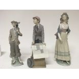 A collection of three Lladro figures a golfer a Su