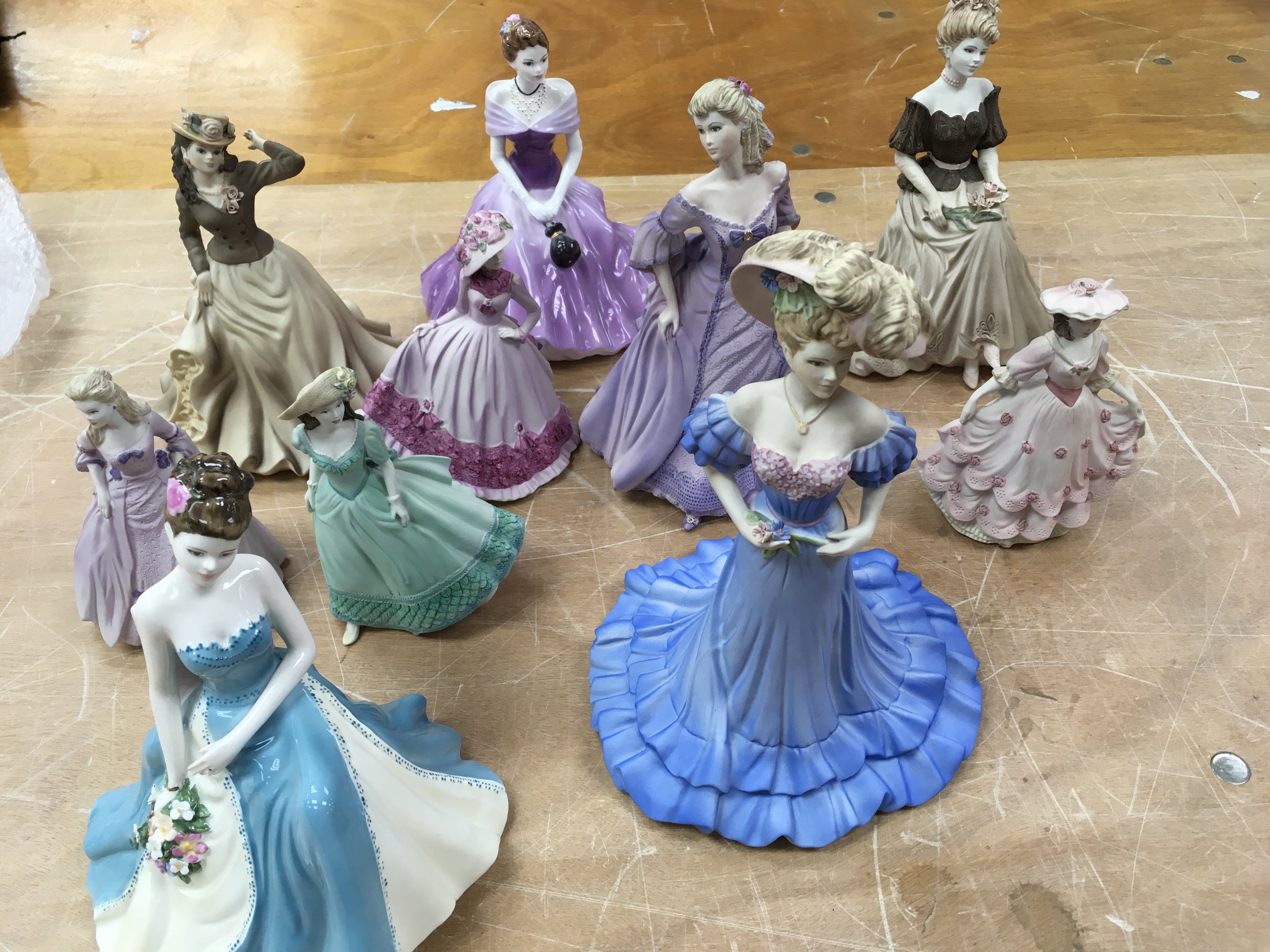 A collection of Coalport figures (10)