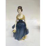 A Royal Doulton figure Melanie and a small German