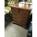 A Small Yew wood chest of drawers with two short a
