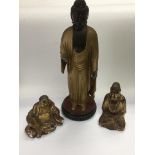 Three giltwood buddhas, largest approx 43.5cm.