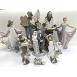 A collection of Lladro figures comprising some rel