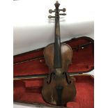 Two antique violins comprising one marked 1868 to label, makers name indistinct, the other is
