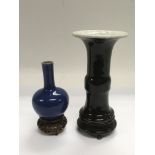 Two Chinese monochrome vases comprising a blue bud