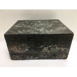 A mother of pearl box with fitted interior and dec