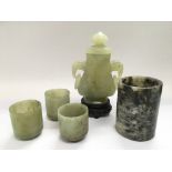 A jade vase and cover, one other jade vase and thr