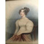 A Framed early Victorian portrait of a young Lady