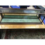 A mahogany and glazed table top display cabinet.86